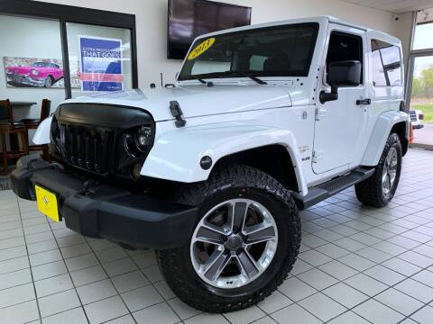 2013 Jeep Wrangler for sale at SAINT CHARLES MOTORCARS in Saint Charles IL