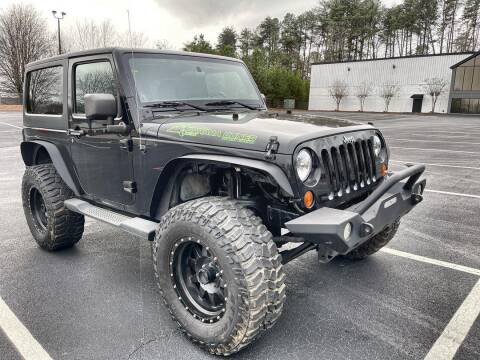 2011 Jeep Wrangler for sale at CU Carfinders in Norcross GA
