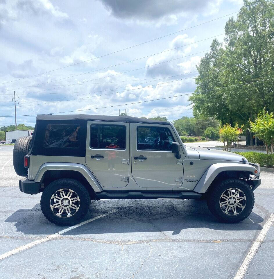 2013 Jeep Wrangler Unlimited for sale at International Car Service, Inc in DULUTH, GA