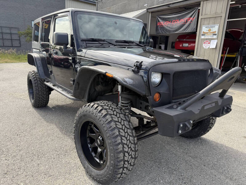 Used 2013 Jeep Wrangler Unlimited Sport with VIN 1C4BJWDG6DL602034 for sale in Olympia, WA