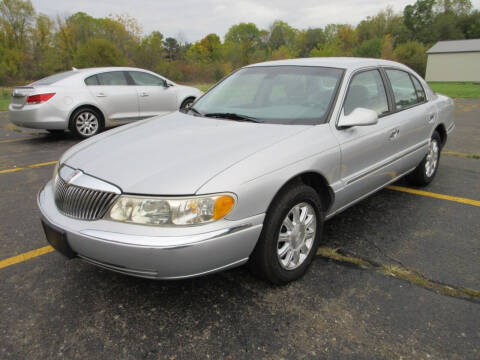 2001 Lincoln Continental for sale at Caruzin Motors in Flint MI