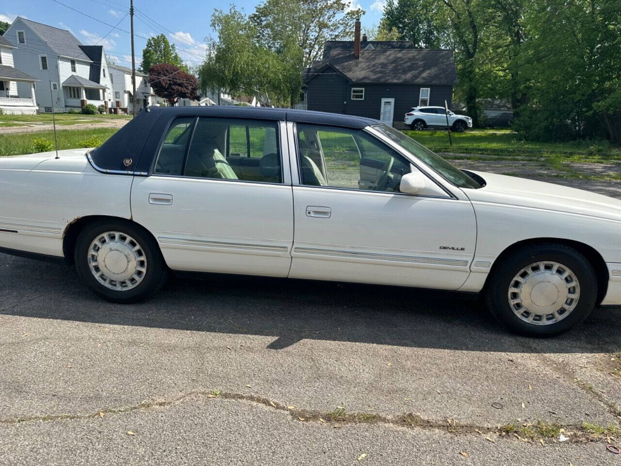 1997 Cadillac DeVille for sale at SRL SAHER in Lorain, OH