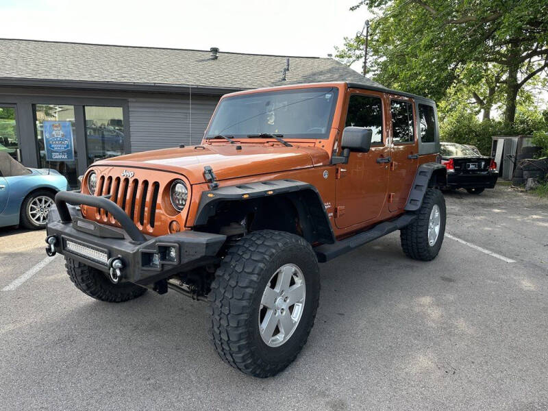 2010 Jeep Wrangler Unlimited for sale at Queen City Classics in West Chester OH