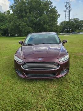 2013 Ford Fusion for sale at AM Auto Sales in Orlando FL