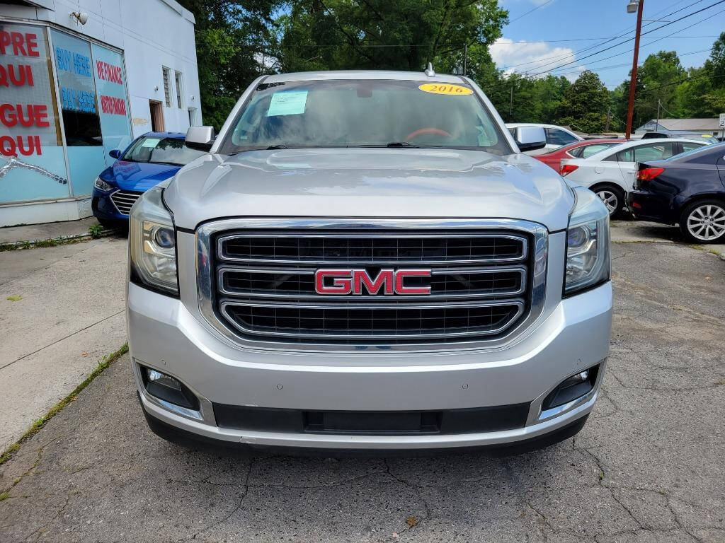 2016 GMC Yukon for sale at DAGO'S AUTO SALES LLC in Dalton, GA