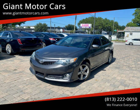 2014 Toyota Camry for sale at Giant Motor Cars in Tampa FL