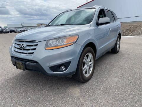 2010 Hyundai Santa Fe for sale at BELOW BOOK AUTO SALES in Idaho Falls ID