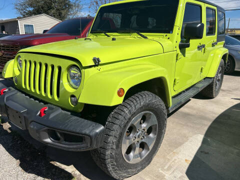 2016 Jeep Wrangler Unlimited for sale at Memo's Auto Sales in Houston TX