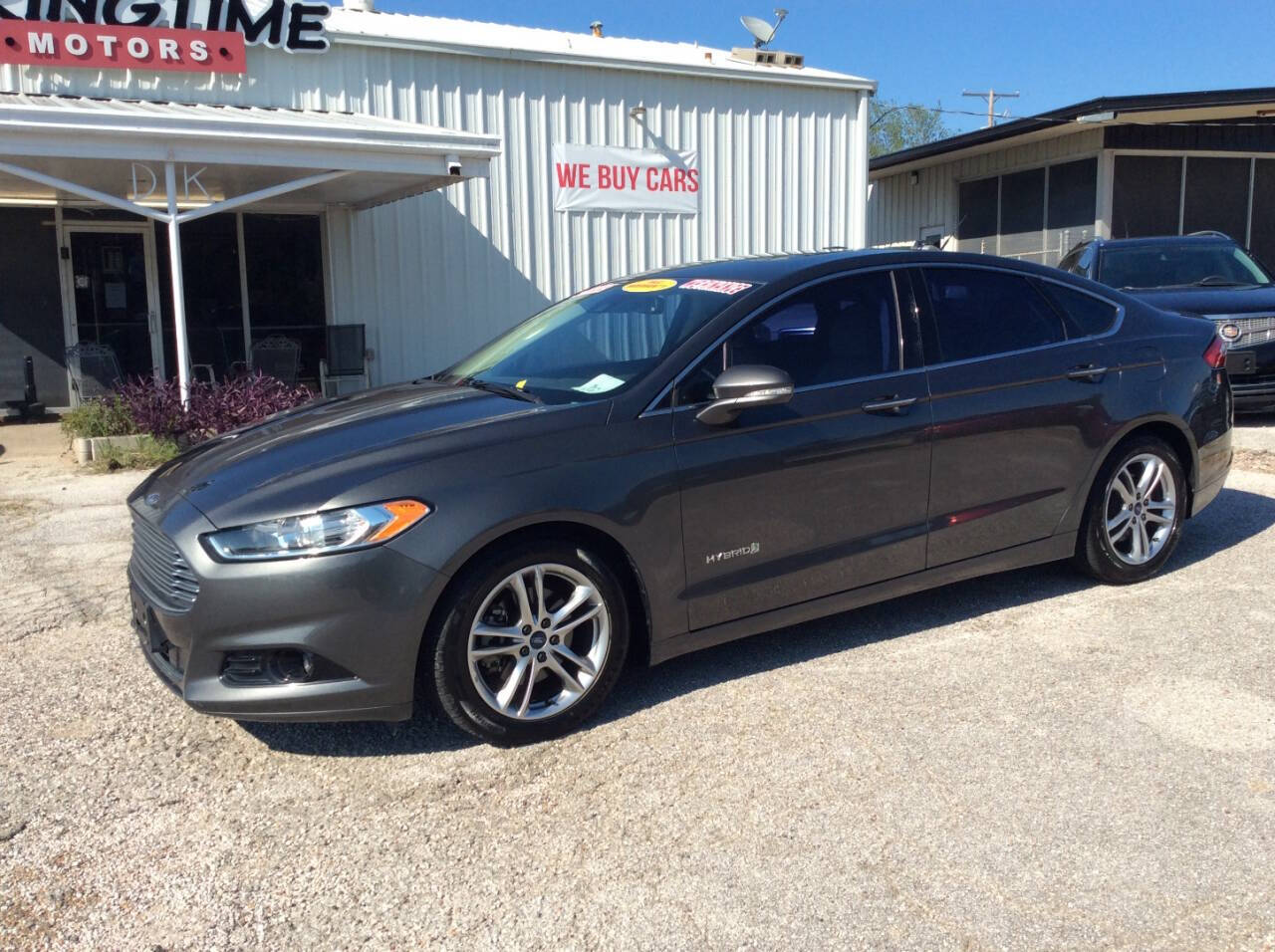 2015 Ford Fusion Hybrid for sale at SPRINGTIME MOTORS in Huntsville, TX