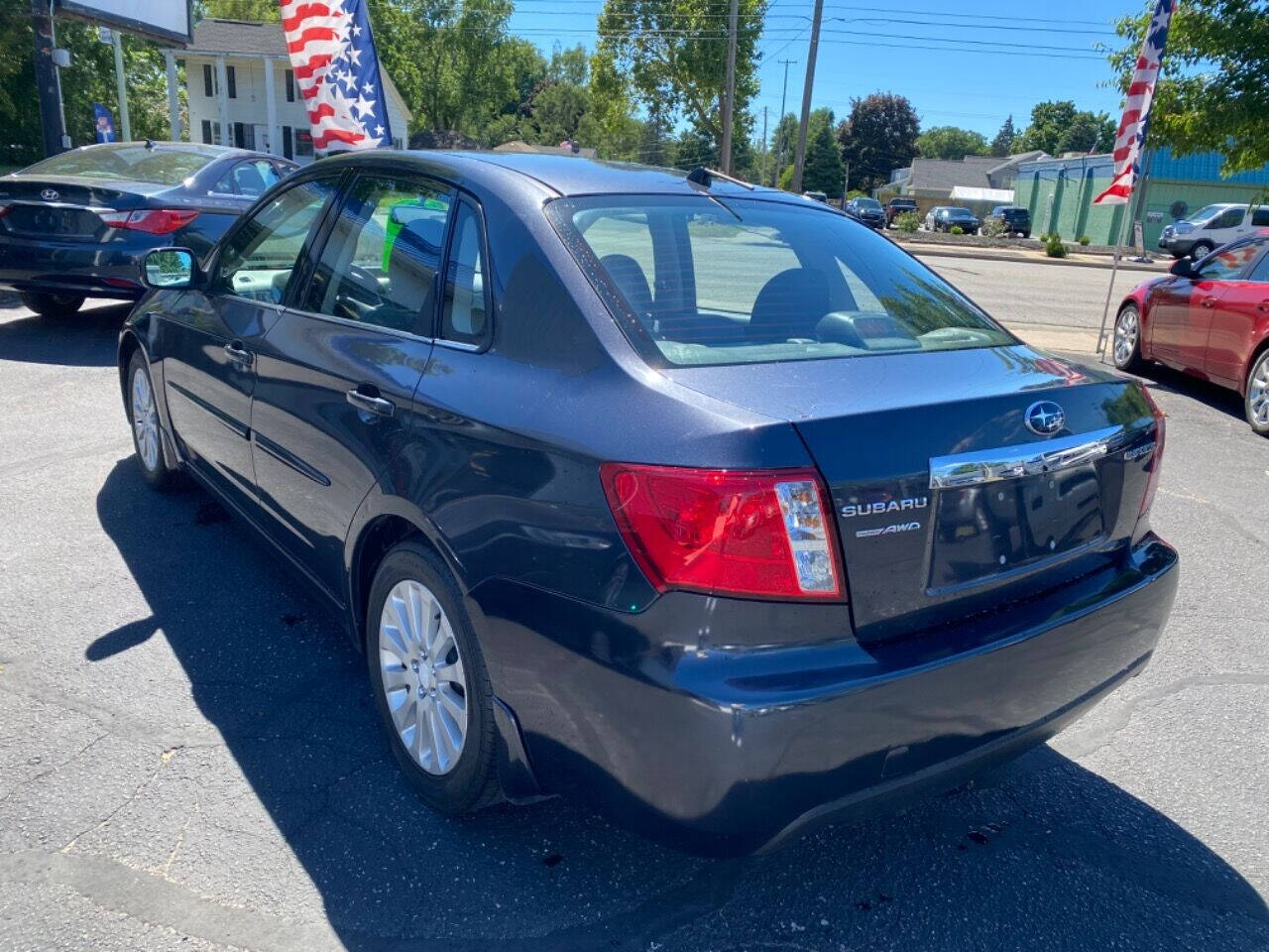 2011 Subaru Impreza for sale at Auto Shop in Wyoming, MI