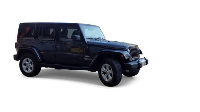 2014 Jeep Wrangler Unlimited for sale at Bowman Auto Center in Clarkston, MI