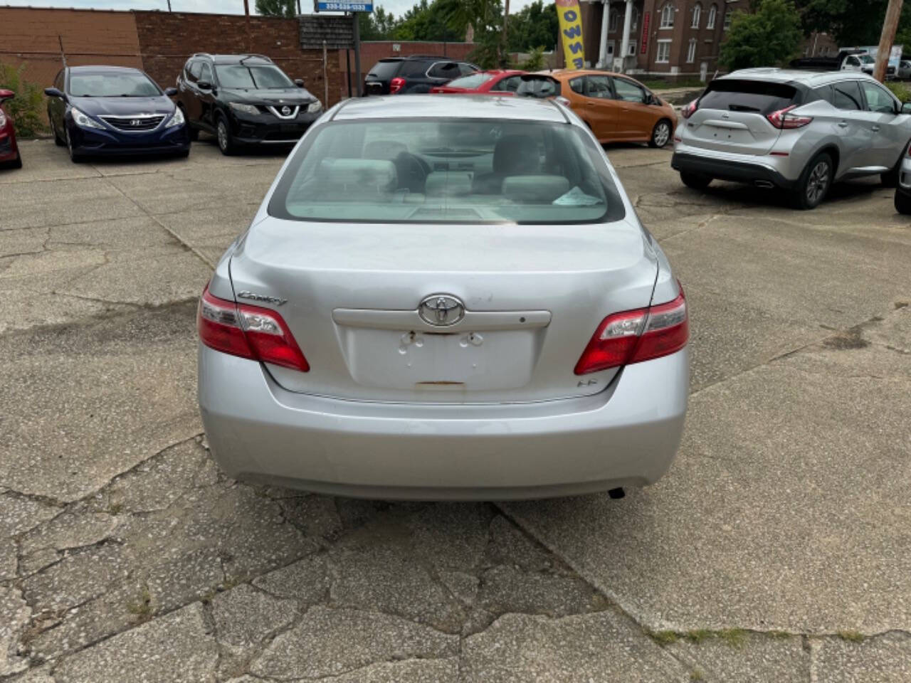 2009 Toyota Camry for sale at First Class Auto Mall in Akron, OH