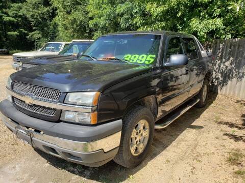 2005 Chevrolet Avalanche for sale at Northwoods Auto & Truck Sales in Machesney Park IL