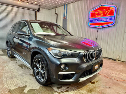 2016 BMW X1 for sale at Turner Specialty Vehicle in Holt MO