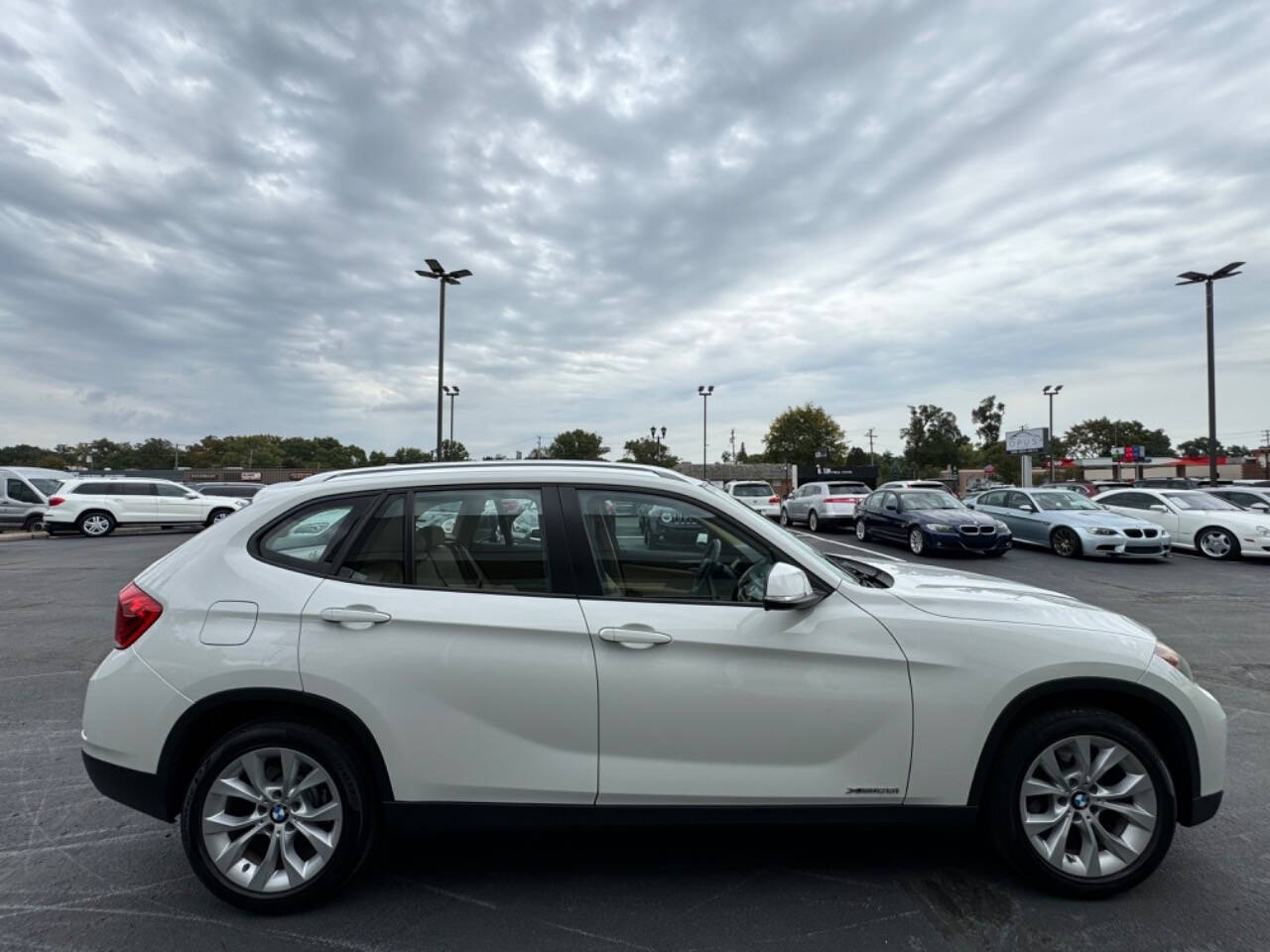 2013 BMW X1 for sale at Opus Motorcars in Utica, MI