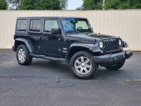 2014 Jeep Wrangler Unlimited for sale at Miller Auto Sales in Saint Louis MI