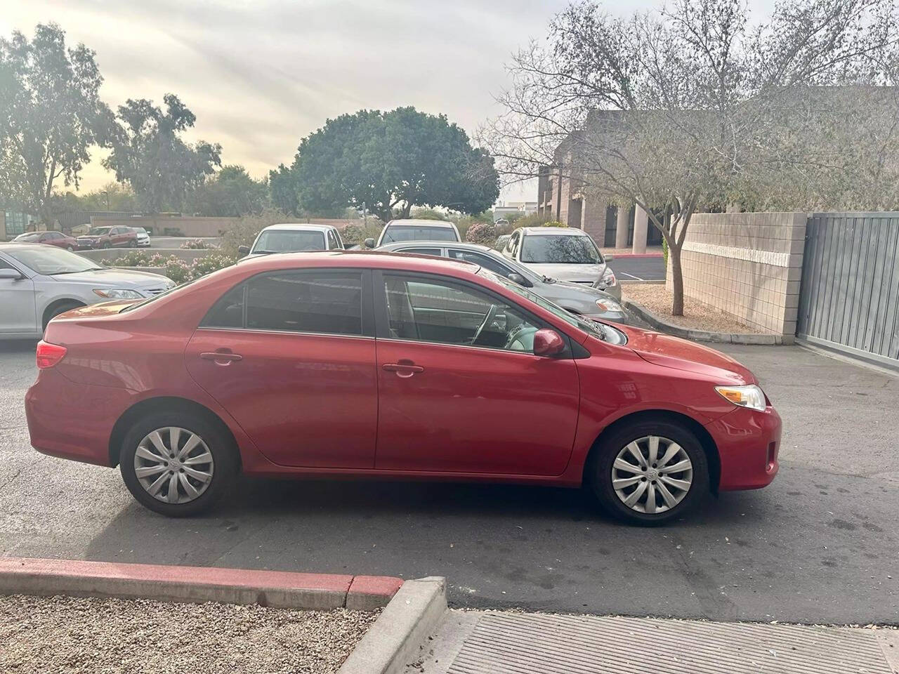 2013 Toyota Corolla for sale at HUDSONS AUTOS in Gilbert, AZ