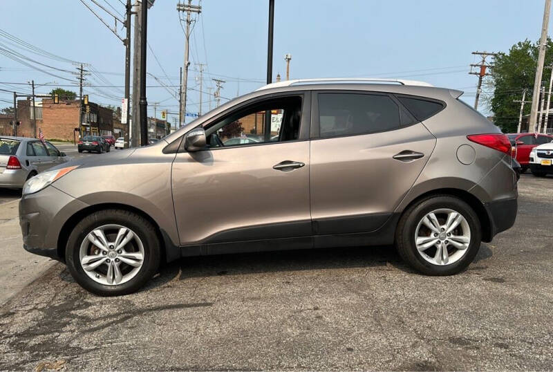 2012 Hyundai Tucson for sale at LONG BROTHERS CAR COMPANY in Cleveland OH