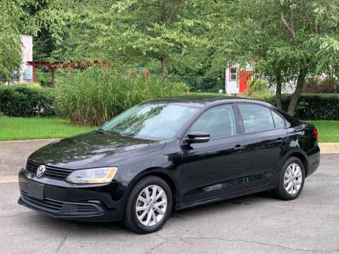 2011 Volkswagen Jetta for sale at Triangle Motors Inc in Raleigh NC