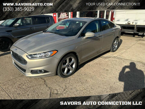 2015 Ford Fusion for sale at SAVORS AUTO CONNECTION LLC in East Liverpool OH