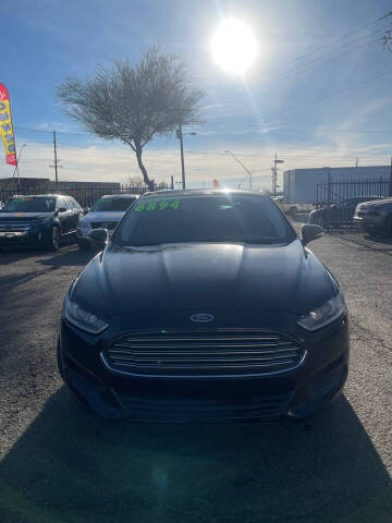 2014 Ford Fusion for sale at Juniors Auto Sales in Tucson AZ