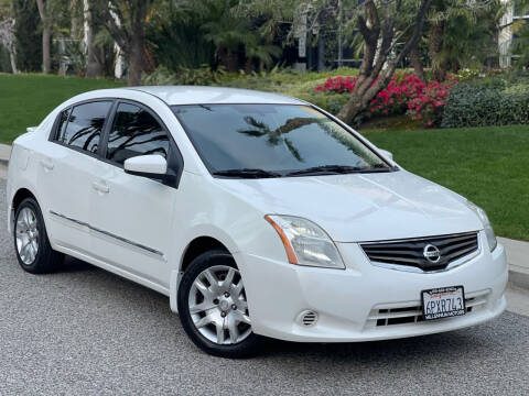 2011 Nissan Sentra for sale at MILLENNIUM MOTORS in Van Nuys CA