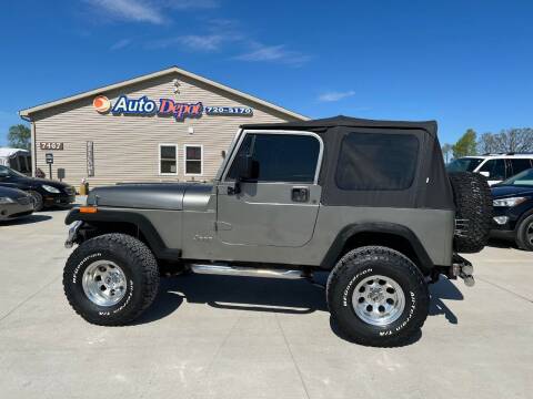 1990 Jeep Wrangler for sale at The Auto Depot in Mount Morris MI