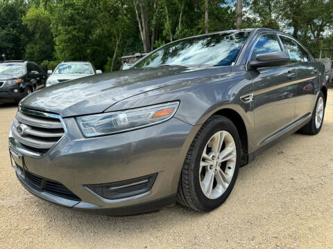 2014 Ford Taurus for sale at Northwoods Auto & Truck Sales in Machesney Park IL