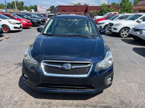 2015 Subaru Impreza for sale at SANAA AUTO SALES LLC in Englewood CO