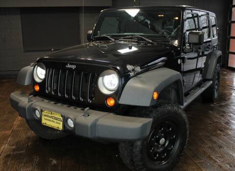 2013 Jeep Wrangler Unlimited for sale at Carena Motors in Twinsburg OH
