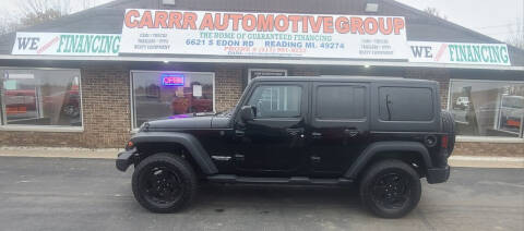 2011 Jeep Wrangler Unlimited for sale at CARRR AUTOMOTIVE GROUP INC in Reading MI