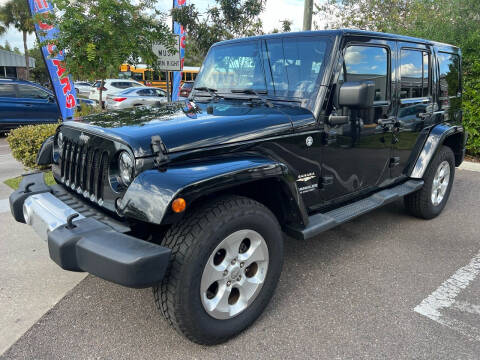 2014 Jeep Wrangler Unlimited for sale at Bay City Autosales in Tampa FL