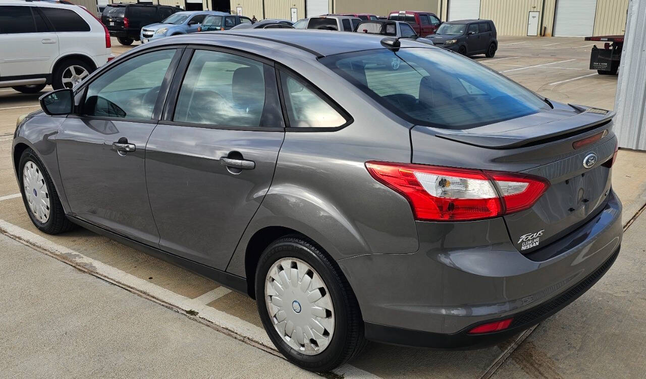 2012 Ford Focus for sale at CAR MARKET AUTO GROUP in Sugar Land, TX