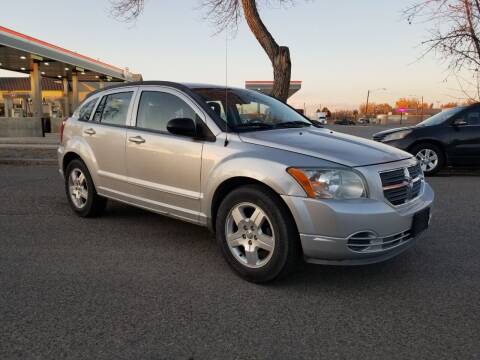 2009 Dodge Caliber for sale at KHAN'S AUTO LLC in Worland WY