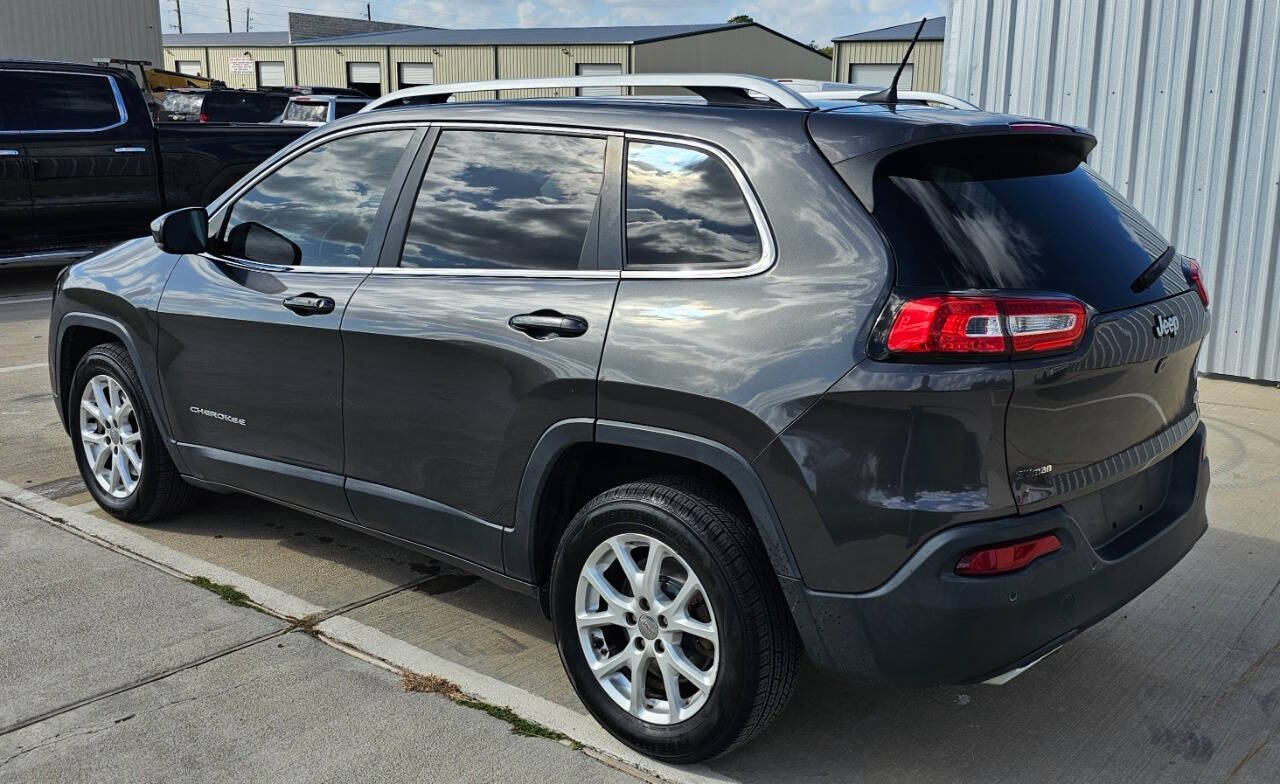 2017 Jeep Cherokee for sale at CAR MARKET AUTO GROUP in Sugar Land, TX