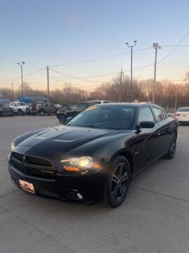 2014 Dodge Charger for sale at Azteca Auto Sales LLC in Des Moines IA