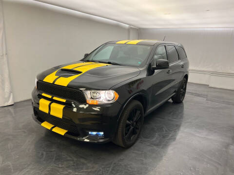 2013 Dodge Durango for sale at Roman's Auto Sales in Warren MI