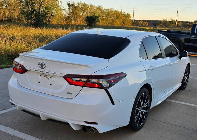 2021 Toyota Camry for sale at CAR MARKET AUTO GROUP in Sugar Land, TX