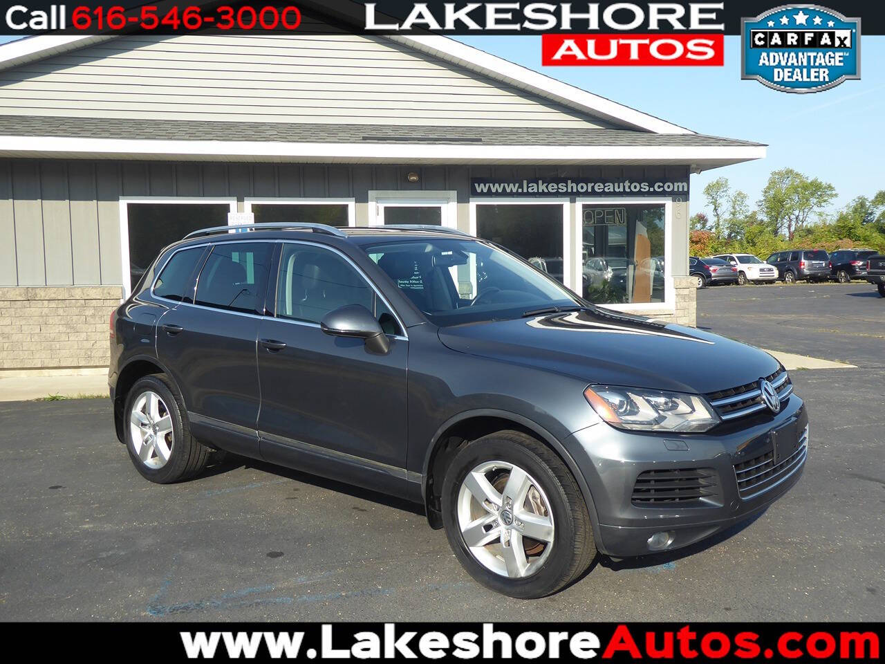 2014 Volkswagen Touareg for sale at Lakeshore Autos in Holland, MI