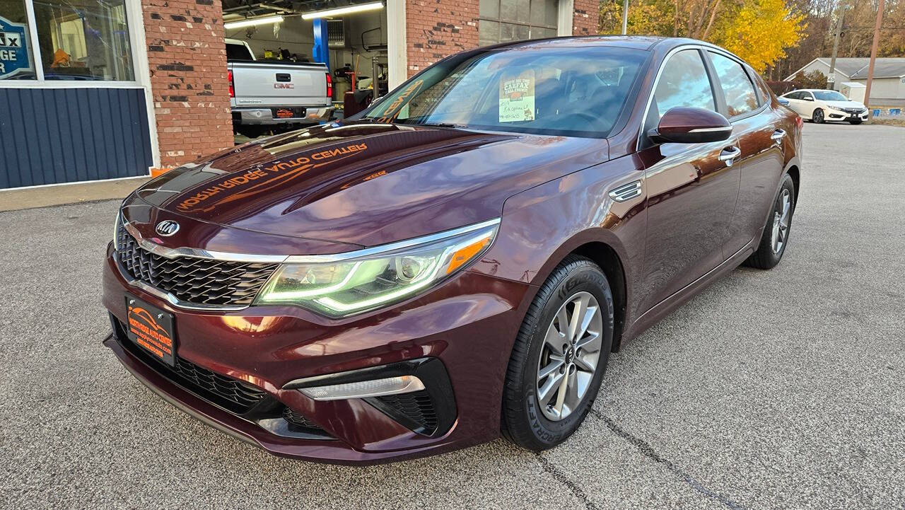 2019 Kia Optima for sale at North Ridge Auto Center LLC in Madison, OH