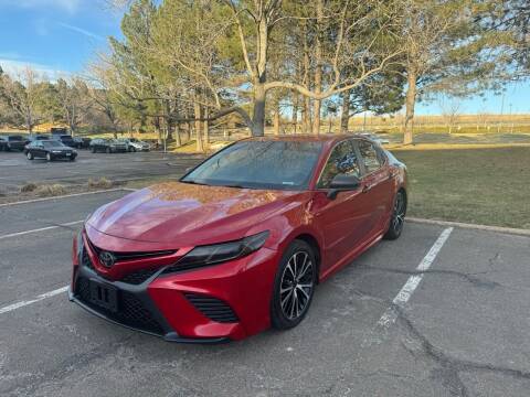 2019 Toyota Camry for sale at QUEST MOTORS in Englewood CO