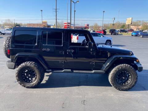 2014 Jeep Wrangler Unlimited for sale at Auto Outlets USA in Rockford IL