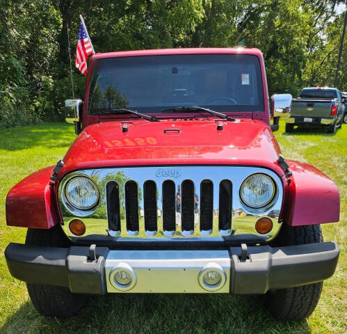 Used 2011 Jeep Wrangler Sahara with VIN 1J4GA5D13BL538201 for sale in New Lenox, IL