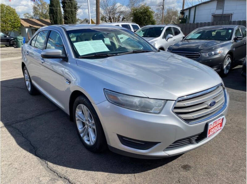 2014 Ford Taurus for sale at Dealers Choice Inc in Farmersville CA