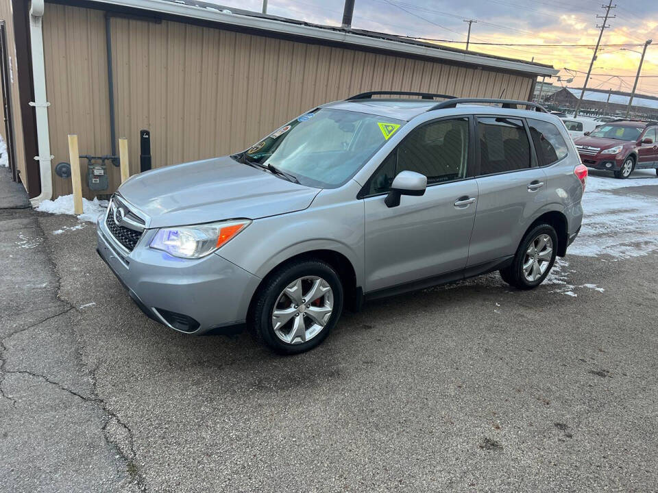 2014 Subaru Forester for sale at BNM AUTO GROUP in GIRARD, OH