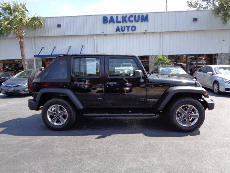 2011 Jeep Wrangler Unlimited for sale at BALKCUM AUTO INC in Wilmington NC