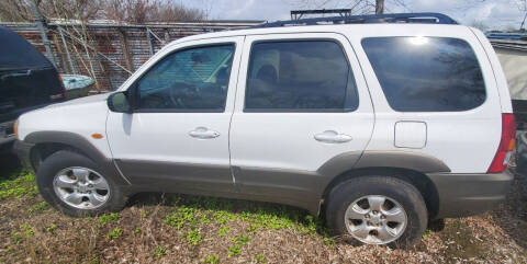 2004 Mazda Tribute for sale at Ody's Autos in Houston TX