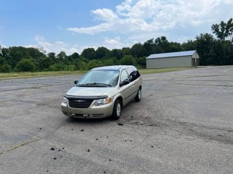 2006 Chrysler Town and Country for sale at Caruzin Motors in Flint MI