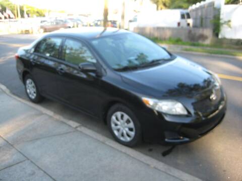 2010 Toyota Corolla for sale at Top Choice Auto Inc in Massapequa Park NY