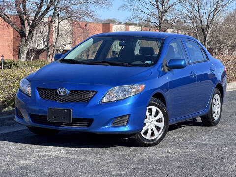2010 Toyota Corolla for sale at Duluth Autos and Trucks in Duluth GA